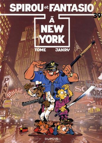 Couverture du livre « Spirou et Fantasio Tome 39 : Spirou et Fantasio à New York » de Tome et Janry aux éditions Dupuis