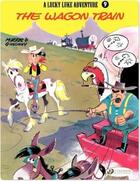 Couverture du livre « Lucky Luke t.9 : the wagon train » de Rene Goscinny et Morris aux éditions Cinebook