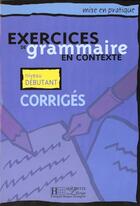 Couverture du livre « Exercices de grammaire en contexte ; niveau débutant ; corrigés » de  aux éditions Hachette Fle
