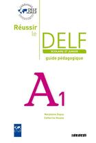 Couverture du livre « Réussir le DELF scolaire et junior ; A1 ; guide pédagogique » de Marjolaine Dupuy et Catherine Houssa aux éditions Didier