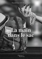 Couverture du livre « La main dans le sac » de Sandrine Guichard aux éditions Baudelaire