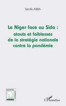 Couverture du livre « Le Niger face au sida : atouts et faiblesses de la stratégie nationale contre la pandémie » de Seidik Abba aux éditions L'harmattan