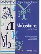 Couverture du livre « Abécédaires ; les 400 motifs à broder au points de croix » de Aurelia Cerulei aux éditions Mango