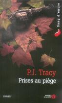 Couverture du livre « Prises au piège » de P. J. Tracy aux éditions Presses De La Cite