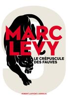 Couverture du livre « Le crépuscule des fauves » de Marc Levy aux éditions Robert Laffont / Versilio