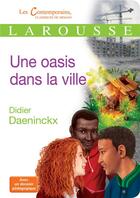 Couverture du livre « Une oasis dans la ville » de Didier Daeninckx aux éditions Larousse
